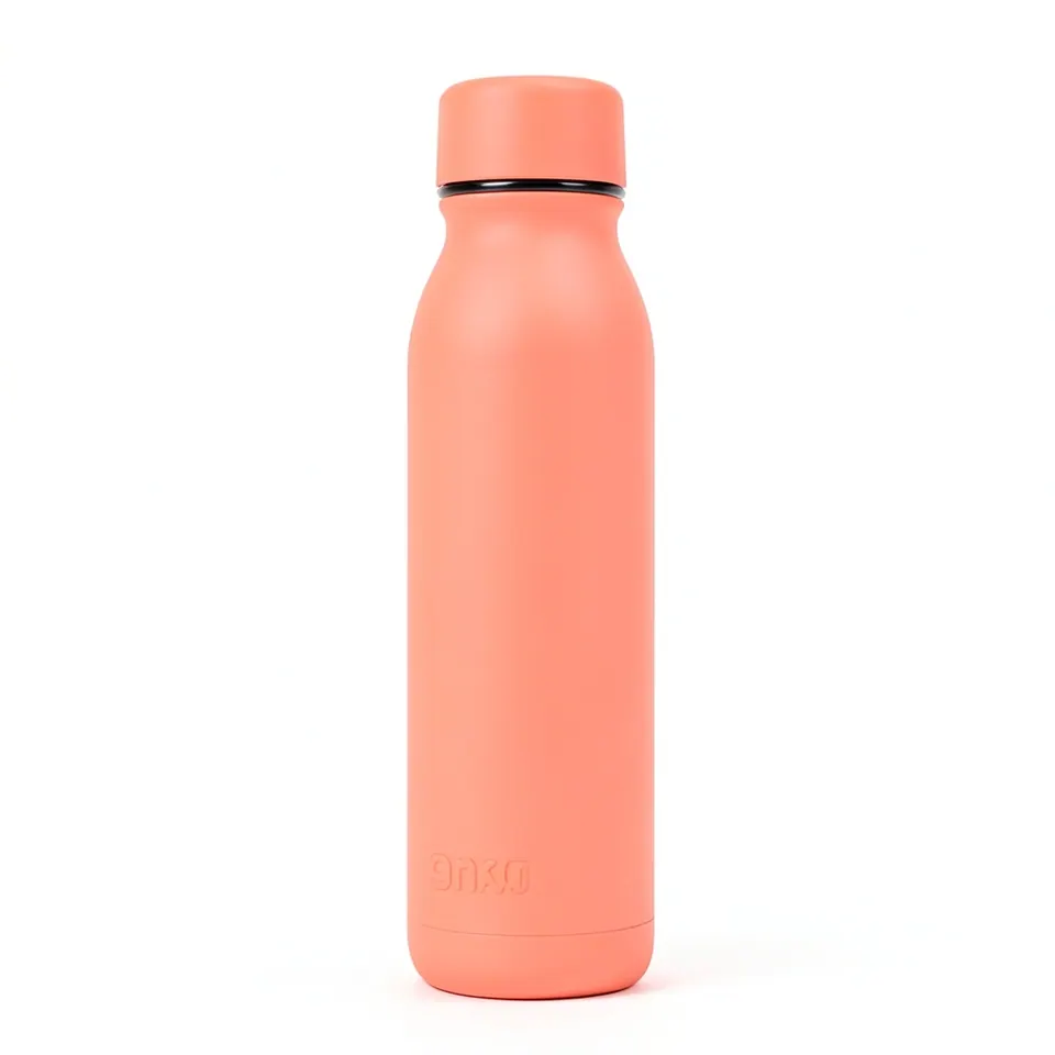 Coral insulated bottle photographed on a seamless white background