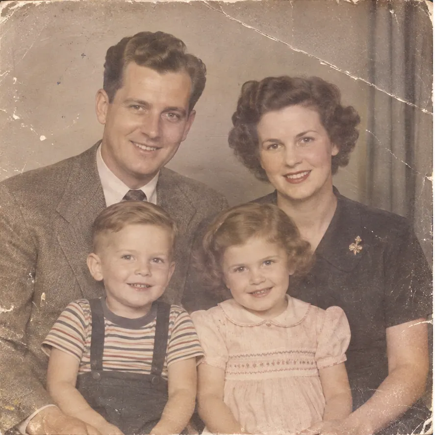 The same old family photo before and after generative restoration — Before